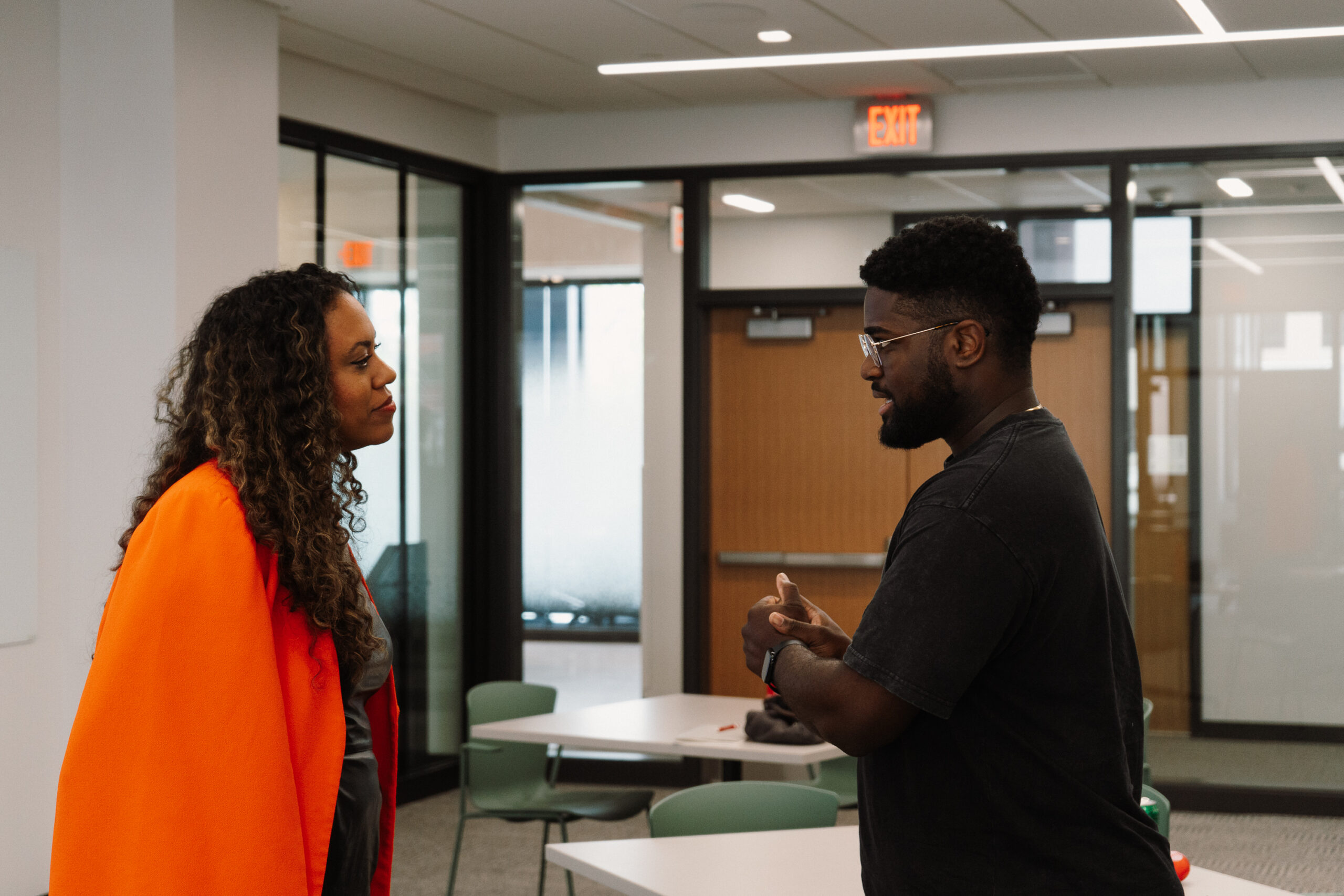 Dr. Jessica Lee Stovall speaks with a student at In Dialogue event.